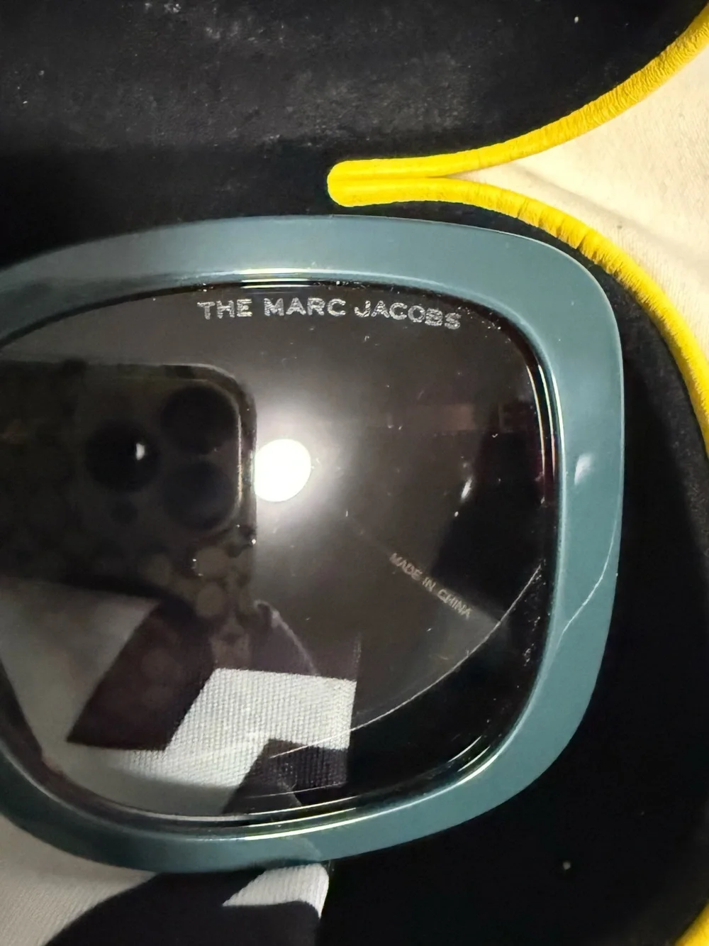 Marc Jacobs Woman’s Dark Teal Square Sunglasses with alternating pink hues! New